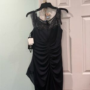 Elegant Black Asymmetrical Dress with Beaded Neckline